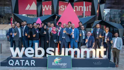 Group photo at Web Summit Qatar event.
