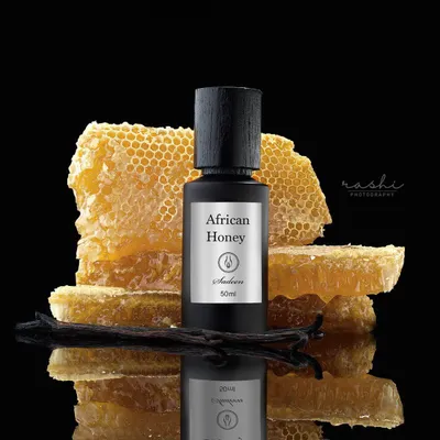 Luxury fragrance product photography featuring honeycomb styling in Doha, Qatar.